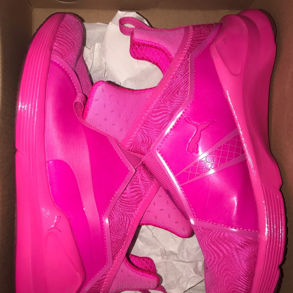 Ladies bright pink Puma sneakers